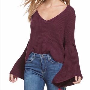 Free People Damsel bell sleeve cotton V-neck sweater in burgundy